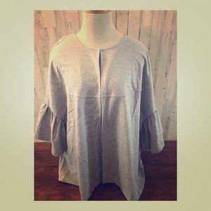 Como black sweater ruffle top